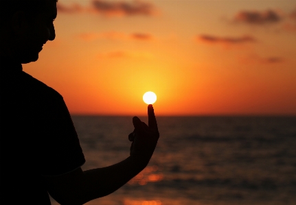 Man beach horizon silhouette Photo