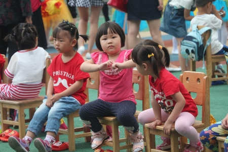 People play chair cute Photo