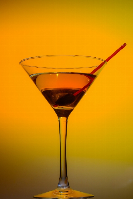 Glass manhattan orange drink