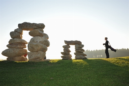 Rock monument green terrain Photo