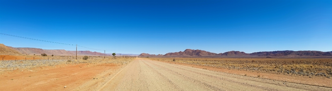 Landscape wilderness road field Photo