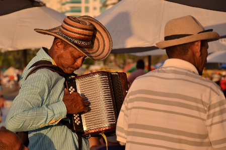 Person people touch hat Photo