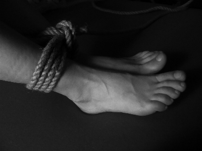 Hand rope black and white woman Photo