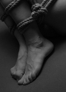 Hand rope black and white woman Photo