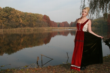 Forest girl lake reflection Photo