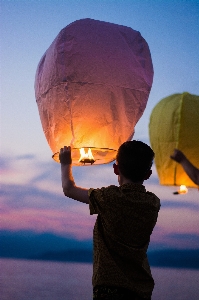 Sea person light sky Photo