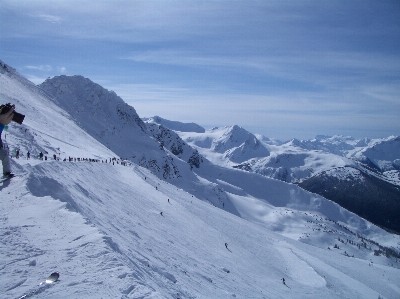 Foto Montagna nevicare inverno cielo