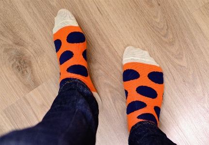 Person shoe wood floor Photo