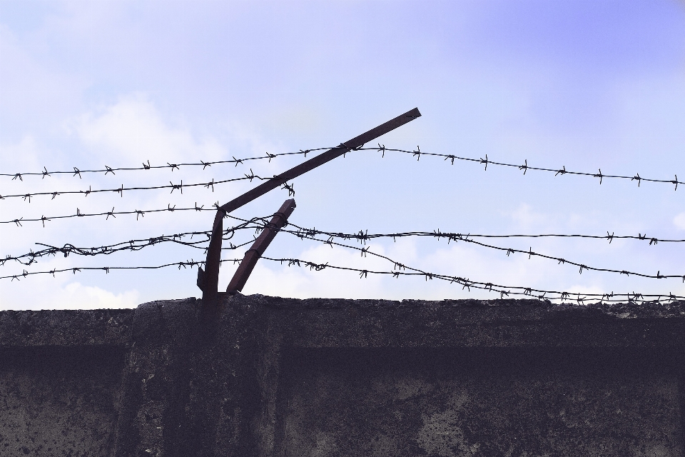 Fence barbed wire sky run