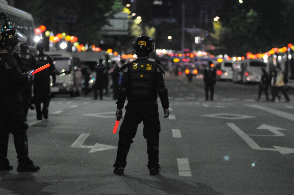 Pedestrian person riot police