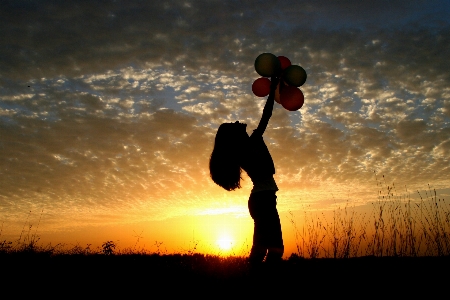 Silhouette light cloud girl Photo