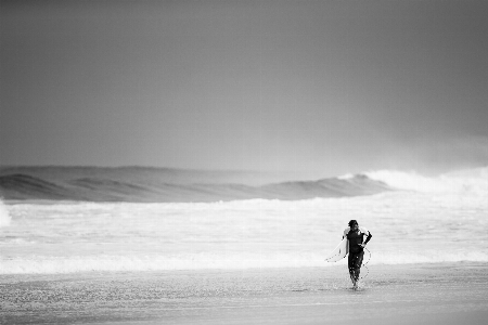 Man beach sea coast Photo