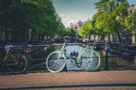 Bridge town cobblestone bicycle Photo