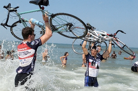 Sea water bicycle celebration Photo