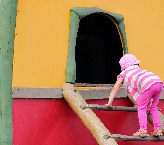 Wood girl play wall Photo