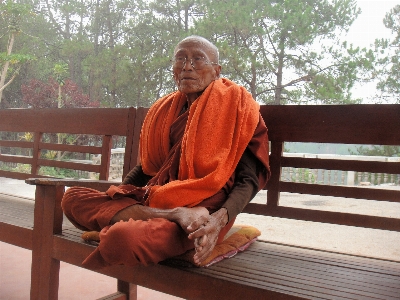 Person sitting monk buddhism Photo