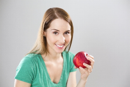 Hand apple person girl Photo