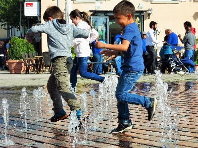 Pedestrian street children fountain Photo