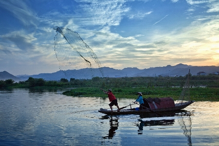 Sea sunset boat lake Photo