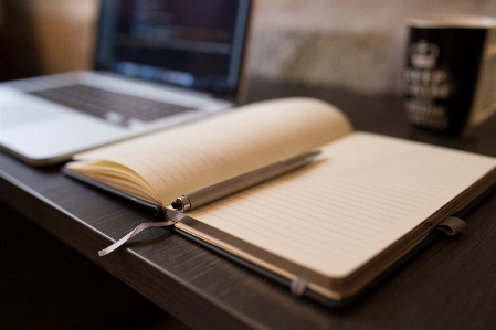 Desk notebook computer writing Photo