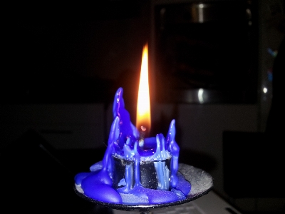 Light glowing dark flame Photo