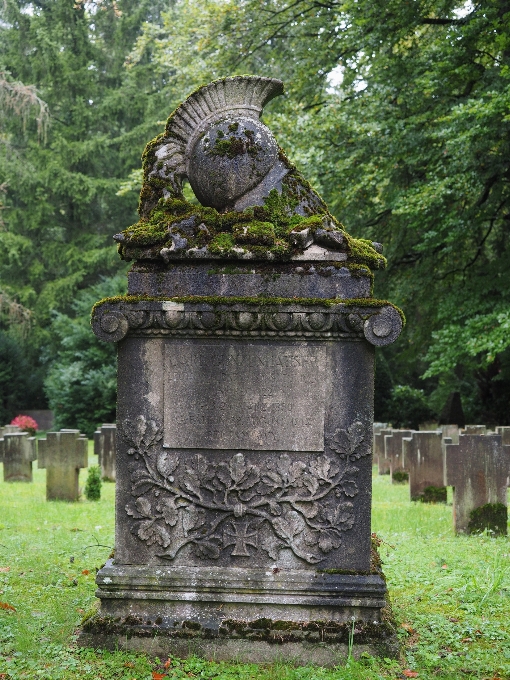 Dark cemetery tombstone grave