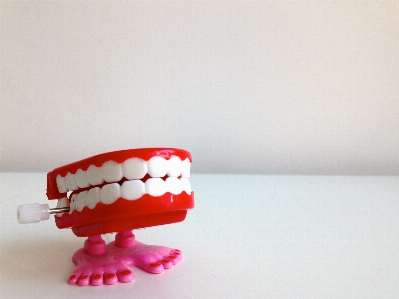 Hand toy mouth teeth Photo