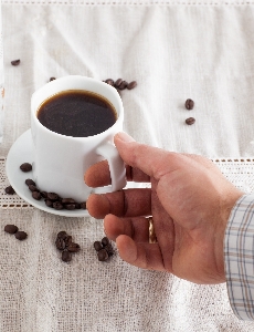 Hand coffee cup food Photo