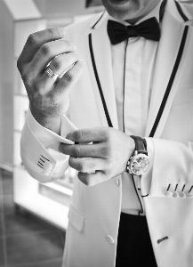 Hand man suit black and white Photo