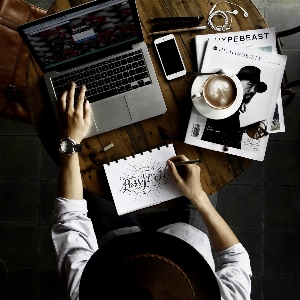 Laptop desk computer writing Photo