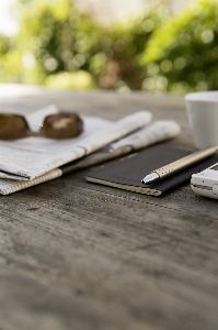 Notebook smartphone writing table Photo