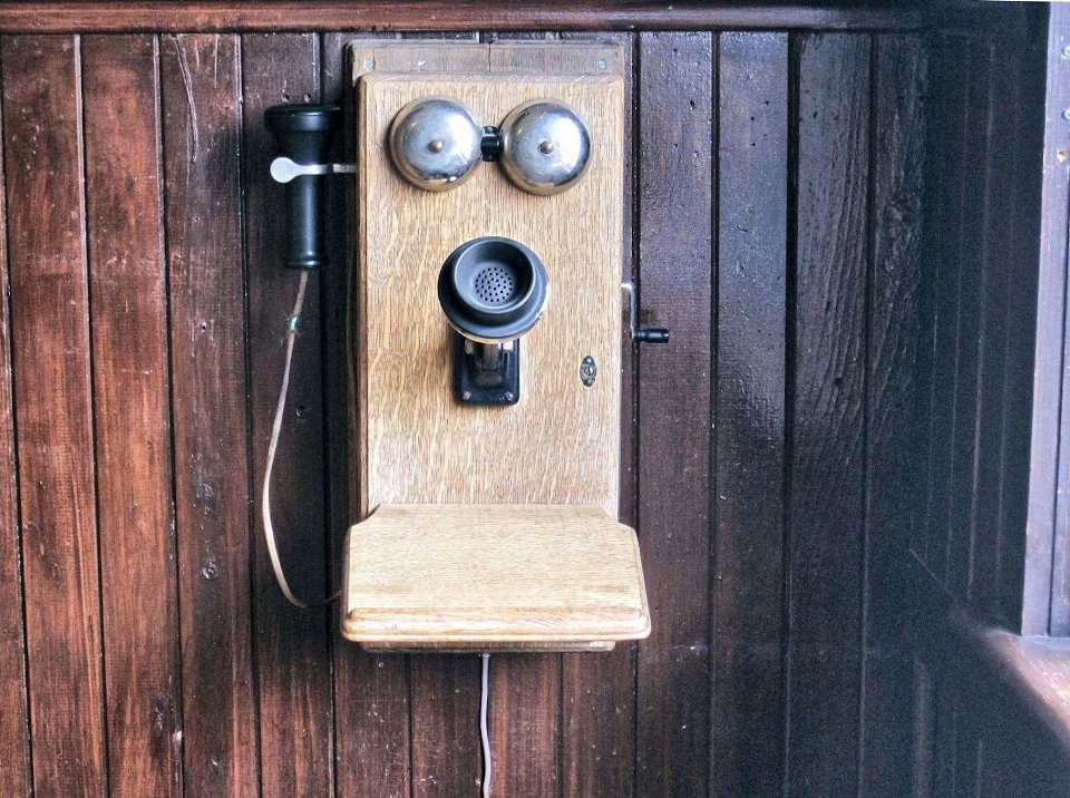 Wood antique retro telephone