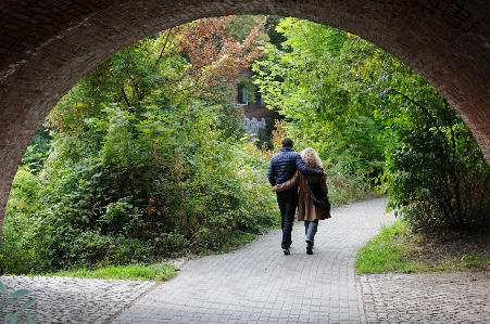 Man tree woman bridge Photo