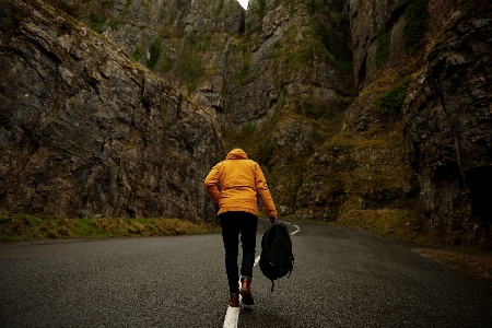 Walking person mountain road Photo