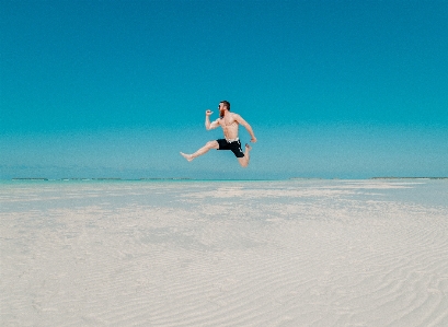 Man beach sea water Photo