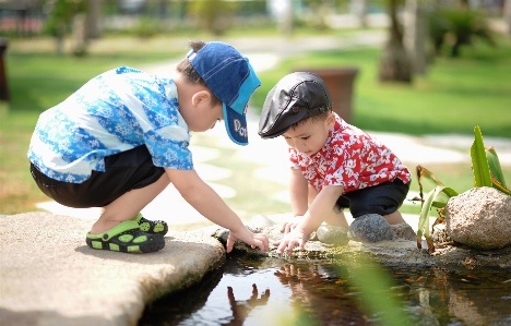 Water people lawn play Photo