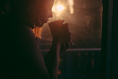 Person coffee light blur Photo