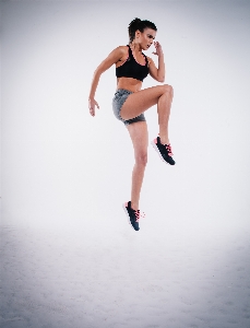 Person woman running jump Photo