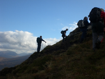 Rock walking mountain sky Photo