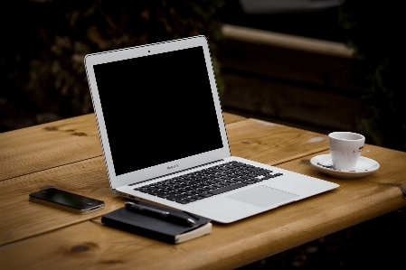 Laptop iphone desk notebook Photo