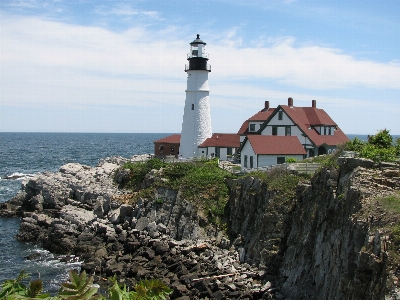 Landscape sea coast lighthouse Photo