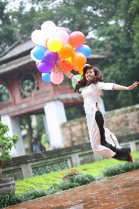 Girl woman flower jump Photo