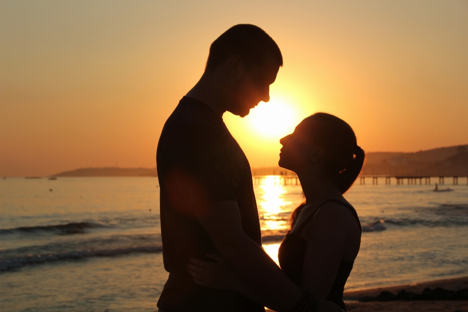 Man beach sea silhouette