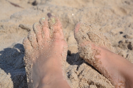 Hand beach sea water Photo