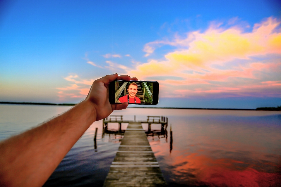 Smartphone hand strand landschaft