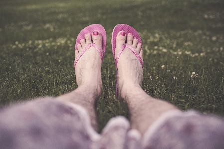 Hand man grass shoe Photo