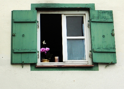 Wood house flower window Photo