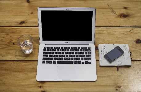 Laptop iphone desk notebook Photo