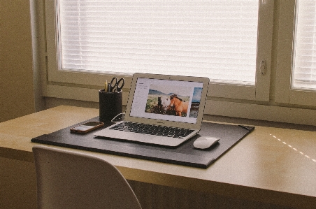 Laptop iphone desk notebook Photo