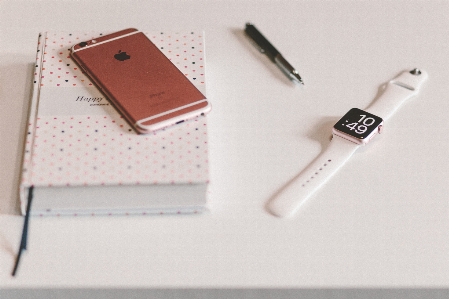 Smartphone watch table book Photo